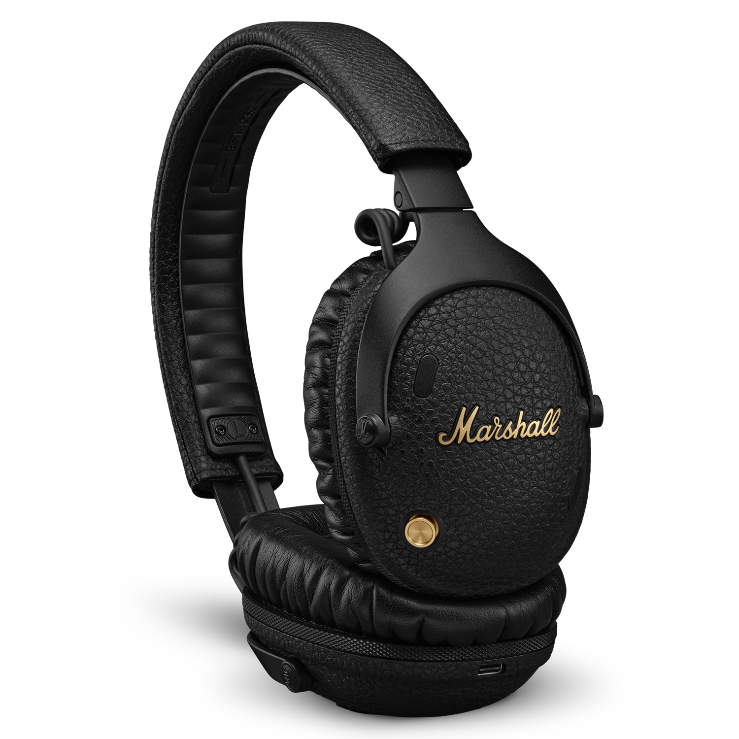 Casque Marshall noir, texture simili cuir, logo doré sur le côté, vue en angle, fond blanc.
