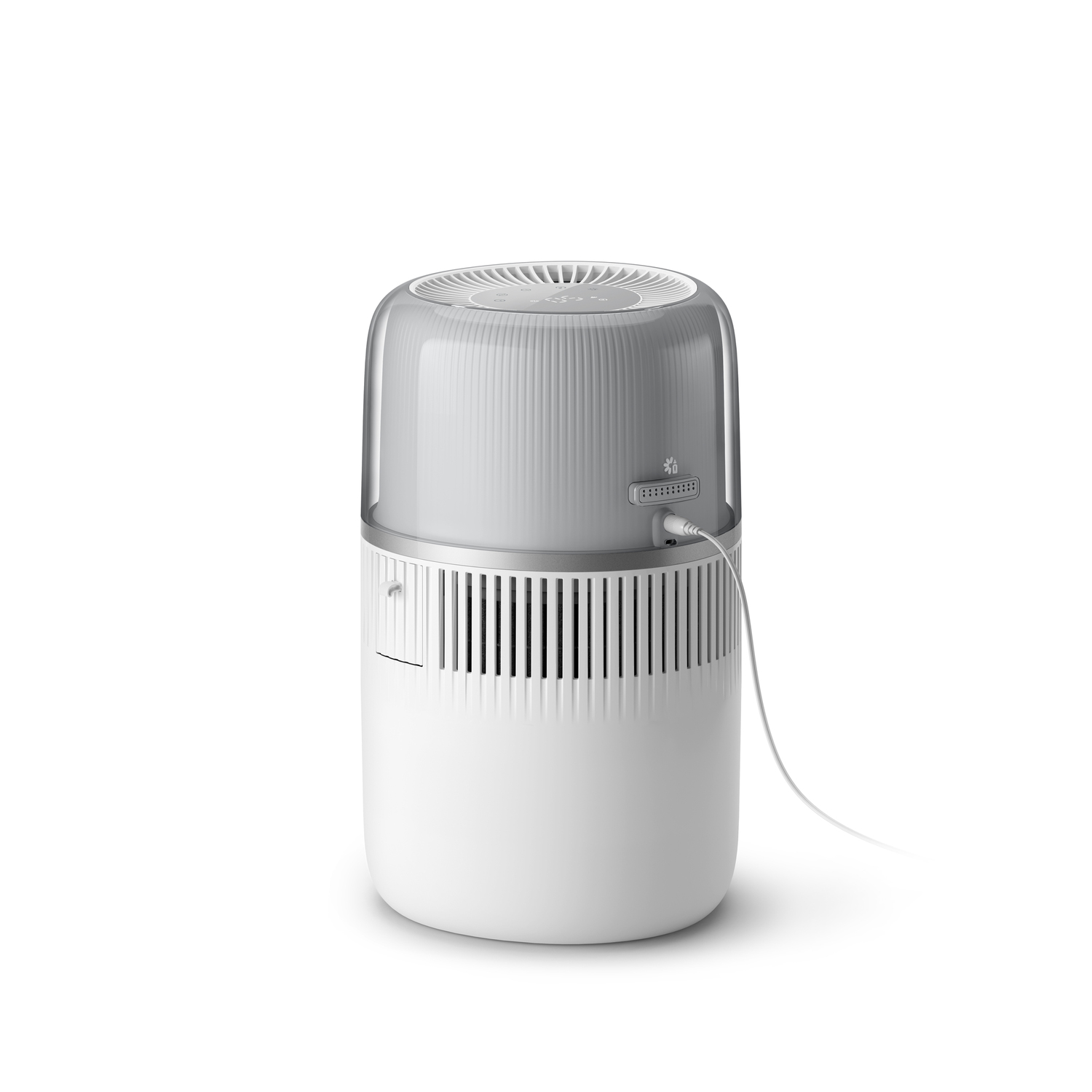 White and gray air purifier. It has a white base and a gray top. A cable is plugged in.
