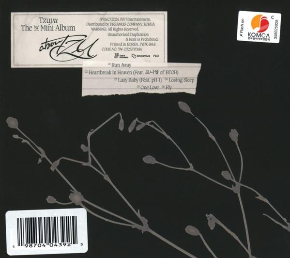 Album hátlapja tracklistával és virágos dizájnnal.
