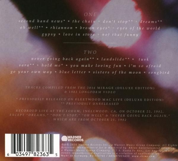 Dos d'un boîtier de CD avec les titres des chansons, un logo Warner Bros. et du texte.