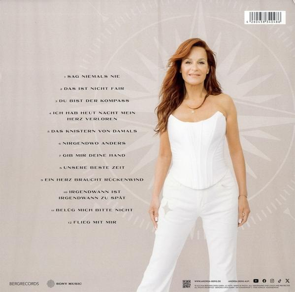 Album-Rückseite mit einer Frau in weißem Kleid. Songtitel und Credits werden angezeigt.