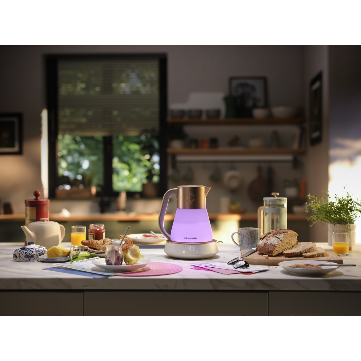 Kitchen counter with a lit purple kettle, food, and other items.