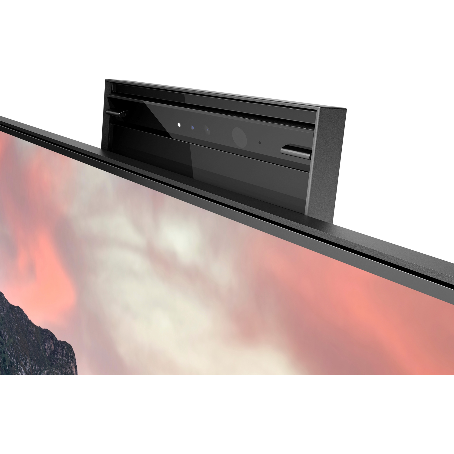 A black device attached to a TV, with a camera. The TV shows a colorful landscape.