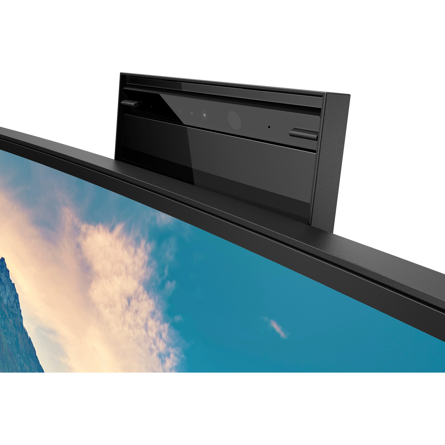 Een zwarte monitor met een camera aan de bovenkant, tegen een luchtachtergrond.