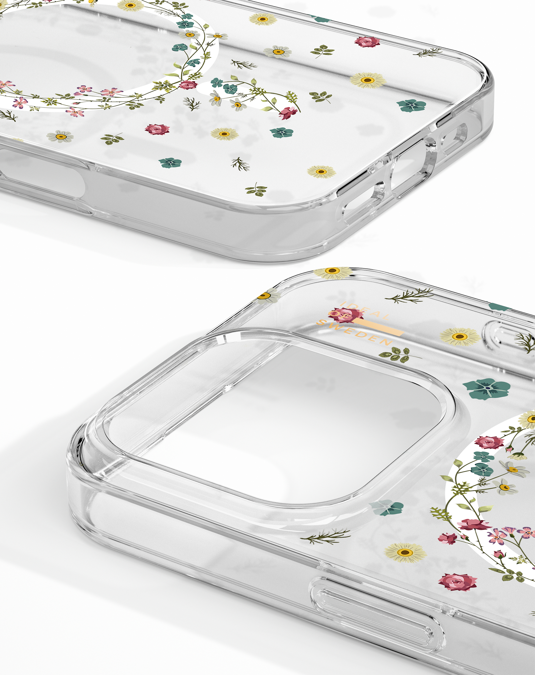 Nahaufnahme einer transparenten Handyhülle mit Blumendesign. Die Hülle liegt auf einer weißen Oberfläche.