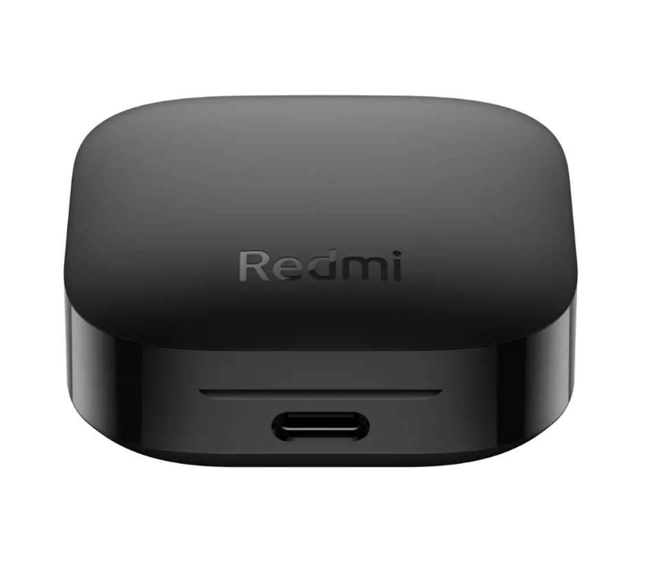 'Redmi' yazılı siyah şarj kutusu ve bir USB-C bağlantı noktası.