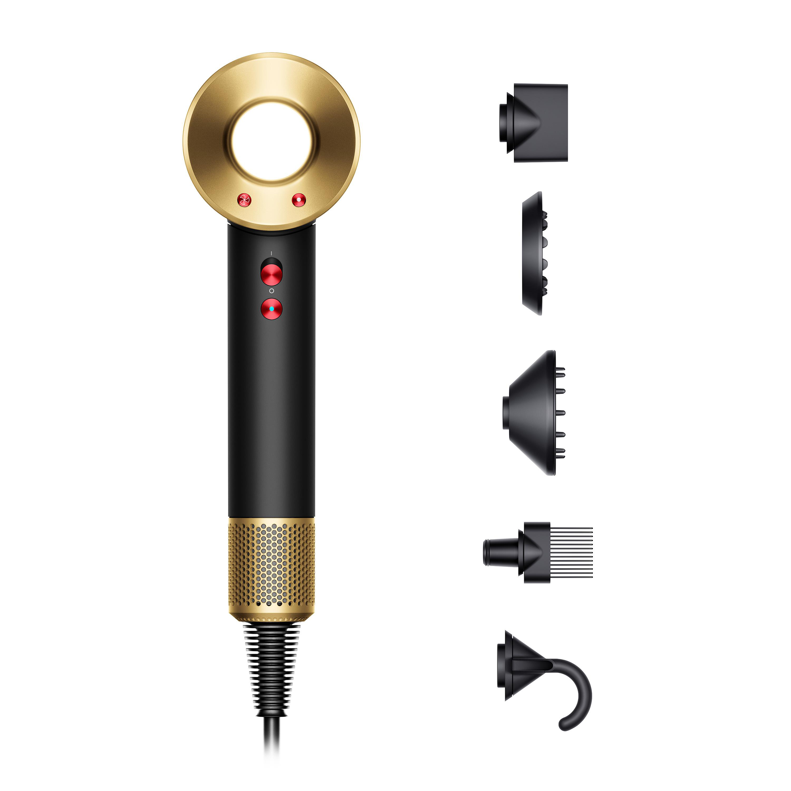 Ein schwarz-goldener Dyson Supersonic Haartrockner mit Aufsätzen, auf weißem Hintergrund.
