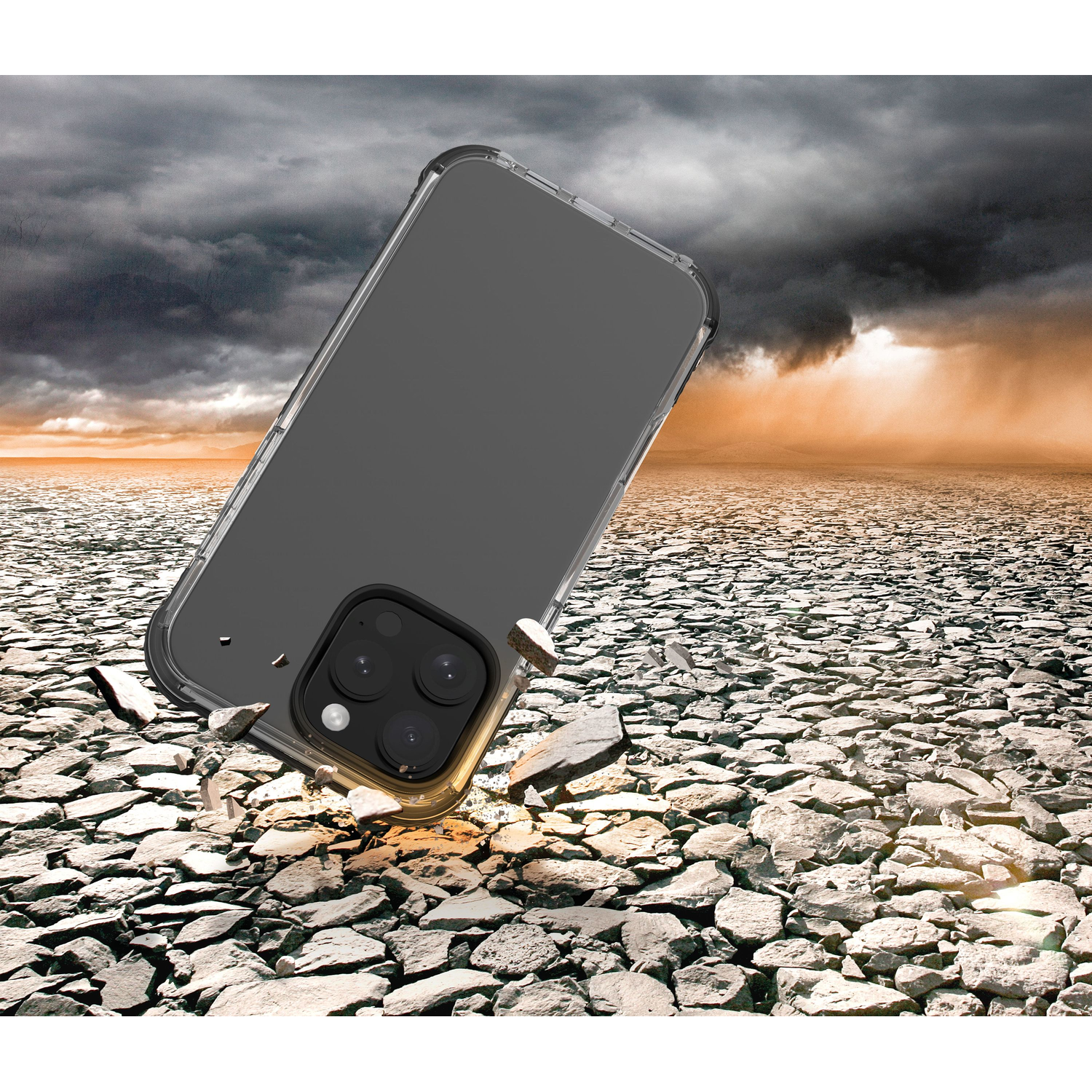 Phone case falling on rocks with a stormy background.