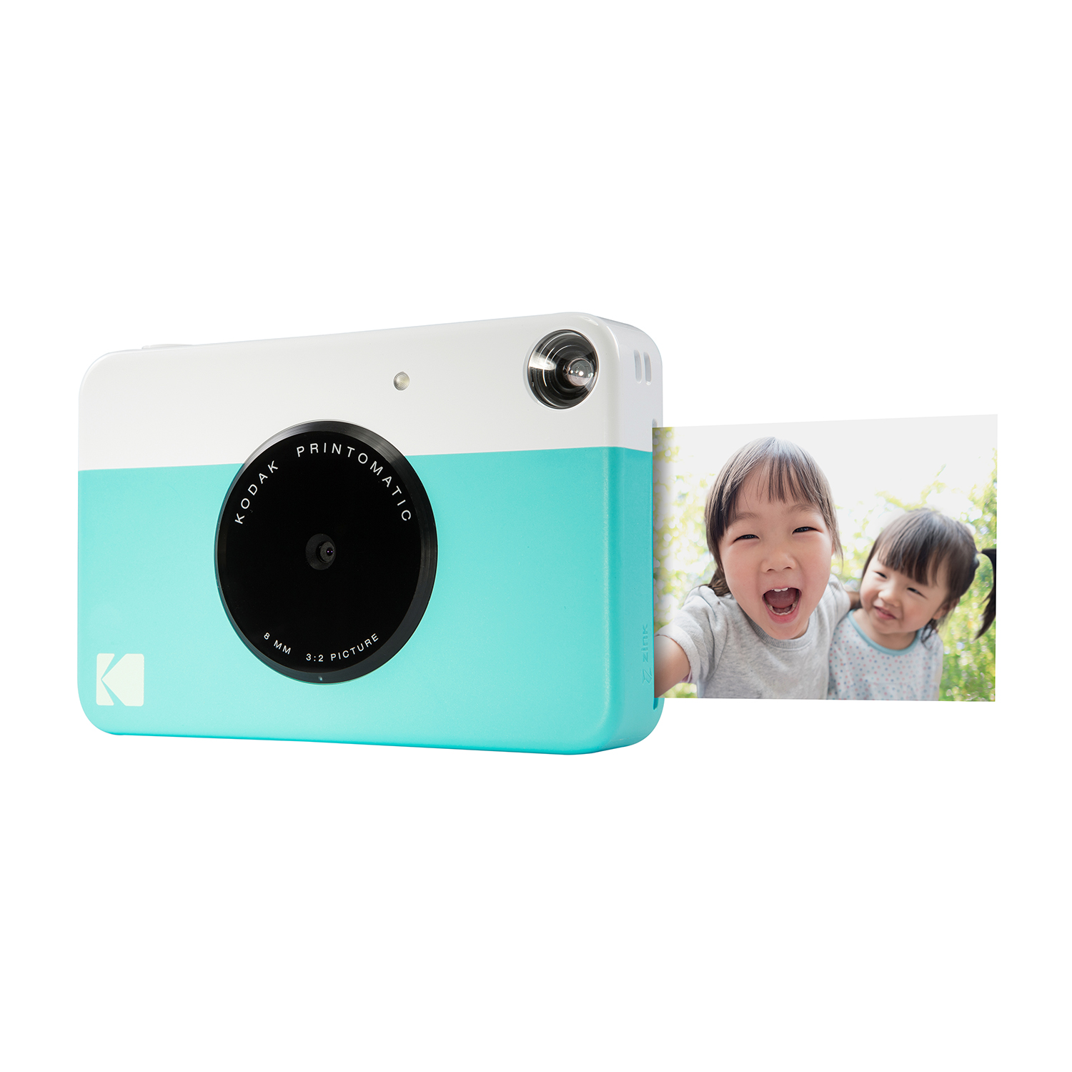 Fotocamera Kodak Printomatic, bianca e acqua, con foto di ragazze sorridenti in stampa.
