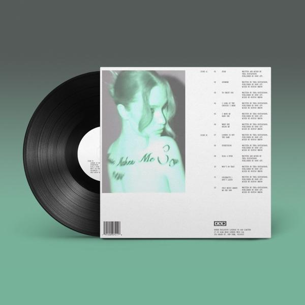 Schallplatte mit Albumcover. Frauenbild auf dem Cover, grüner Farbton. Text auf der Rückseite.