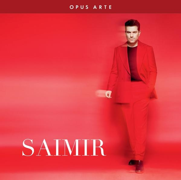 Albumcover. Mann im roten Anzug auf rotem Hintergrund mit dem Wort 