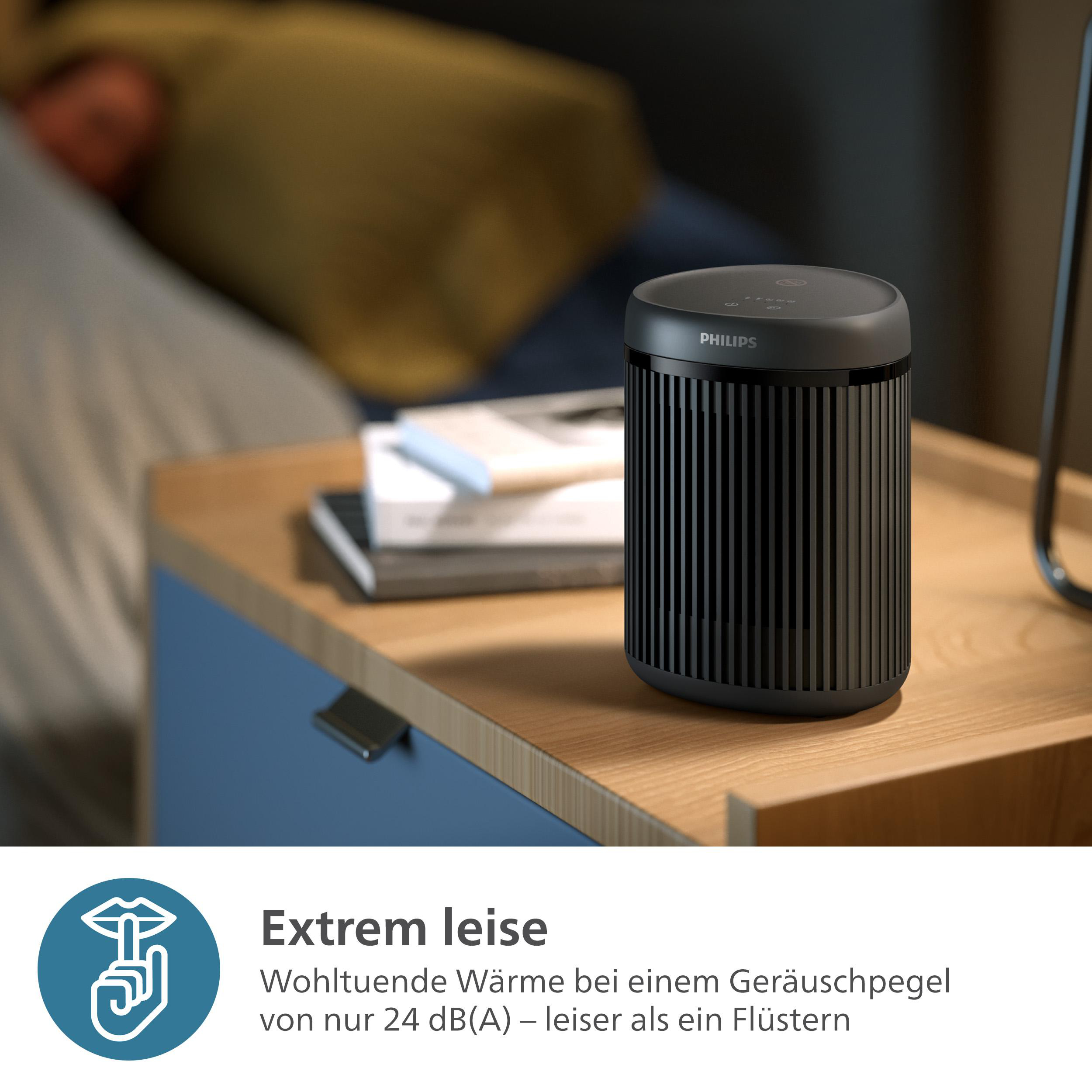 Schwarzer Luftreiniger auf einem Nachttisch aus Holz mit Text über leisen Betrieb. Blaues und weißes Farbschema.