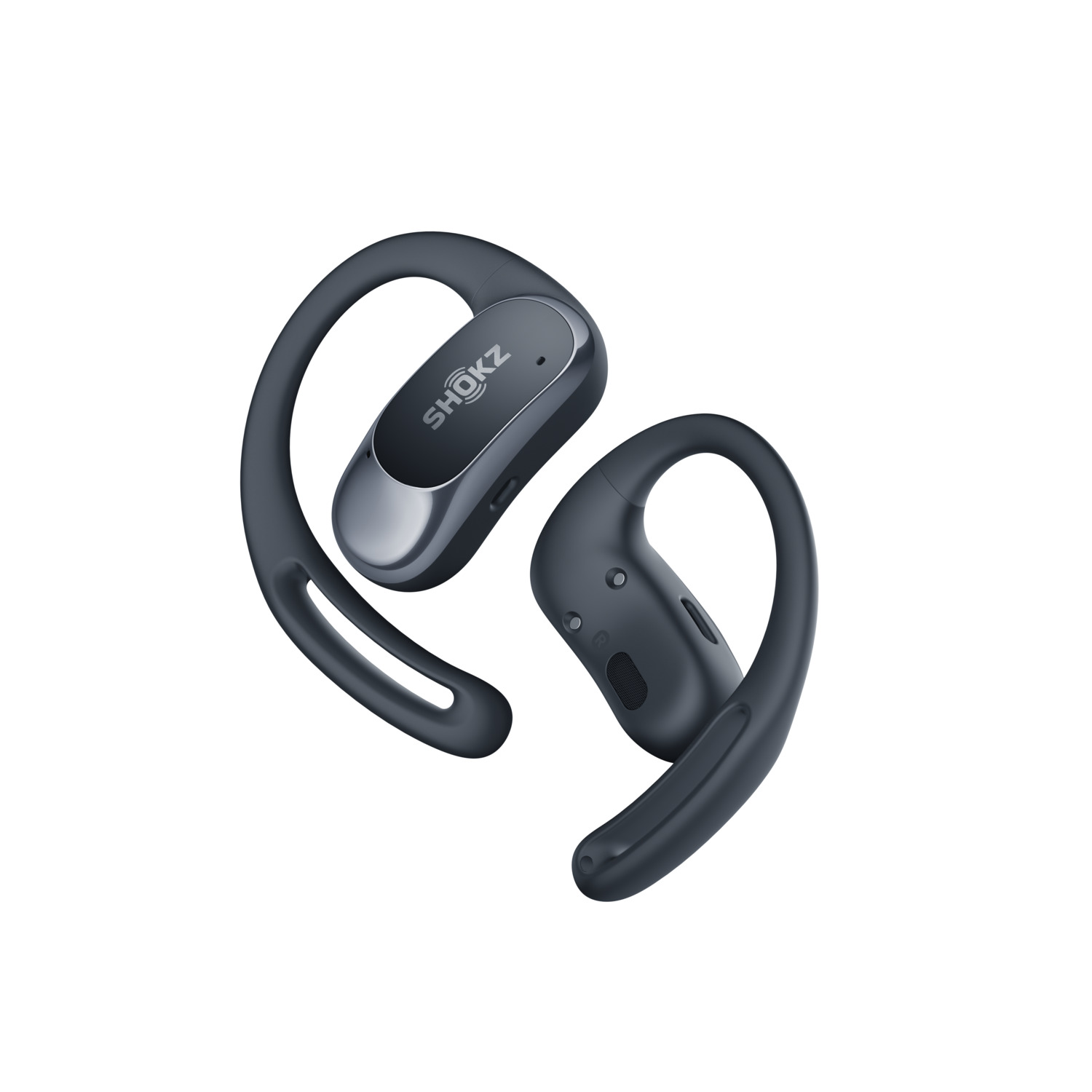 Paire d'écouteurs Shokz gris. Le design comprend un crochet qui passe sur l'oreille.