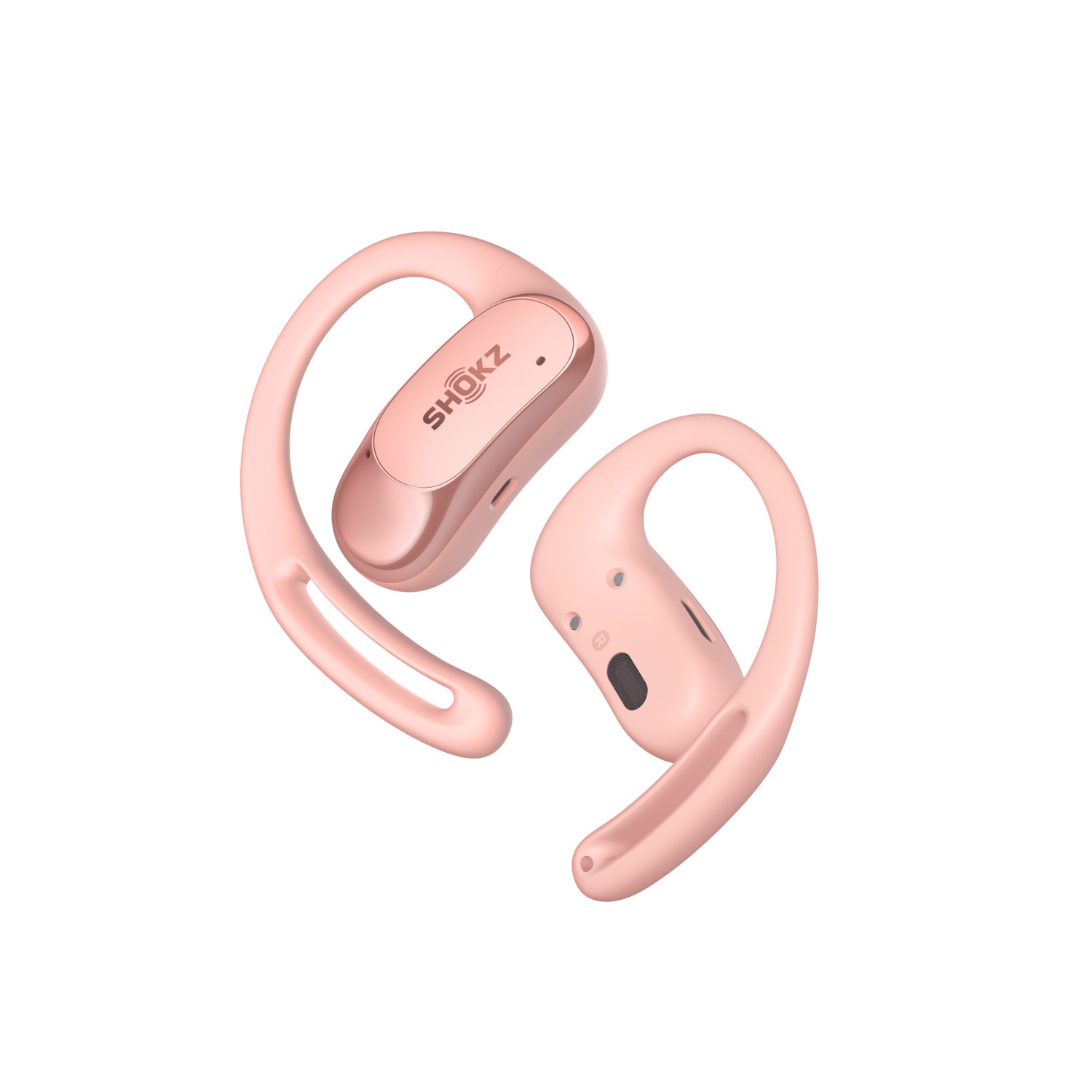 Écouteurs Shokz roses. La conception comporte un crochet qui passe sur l'oreille pour un ajustement sûr.