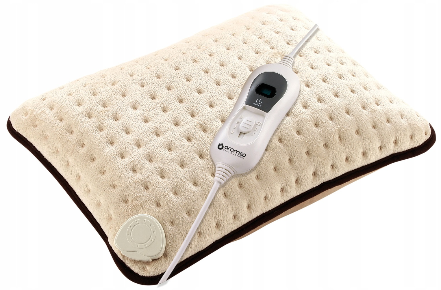 Beżowa elektryczna poduszka grzewcza z białym panelem sterowania leży na powierzchni.