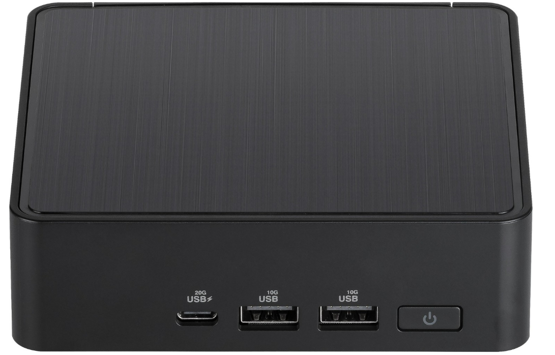 Schwarzer Mini-PC mit Anschlüssen. Die Oberseite hat eine gebürstete Metalloberfläche. Die Vorderseite hat USB und Power-Taste.