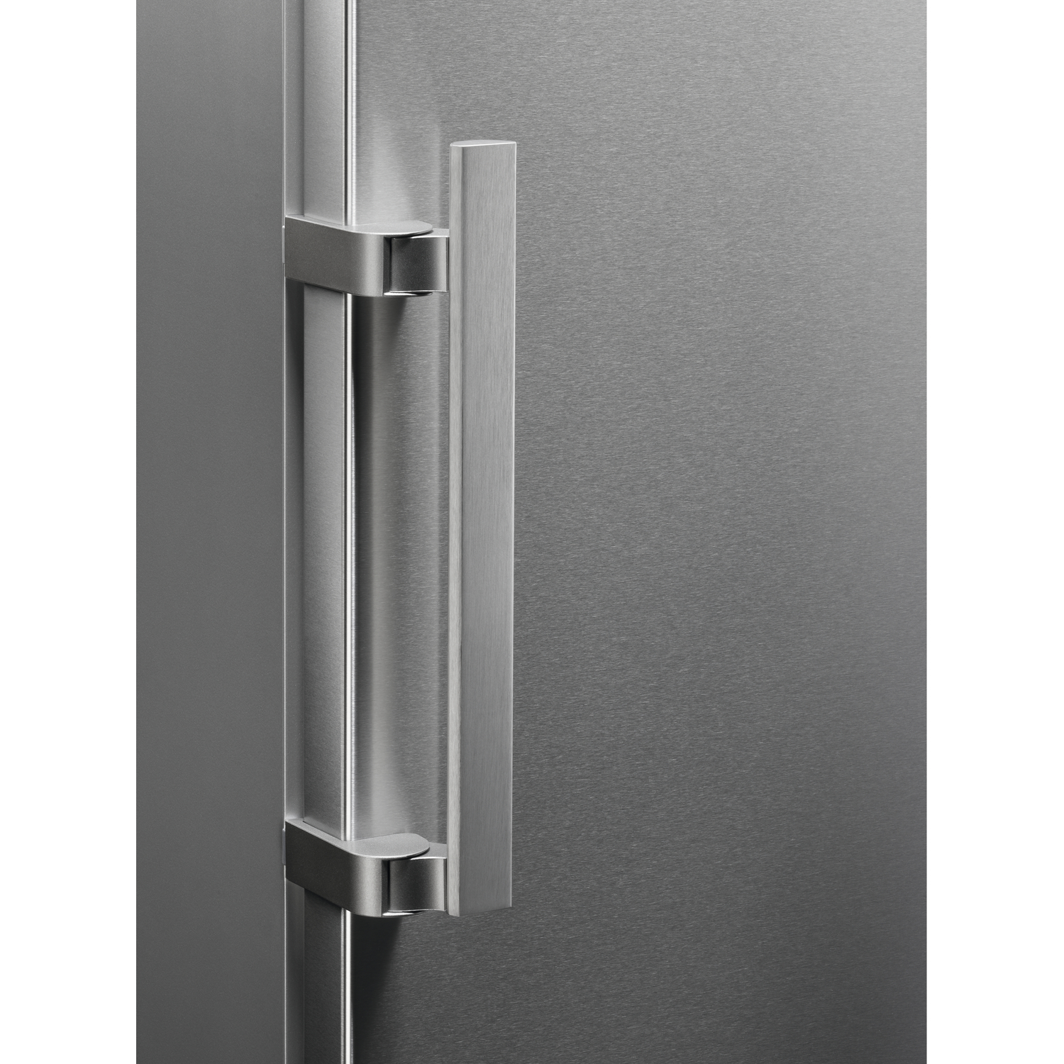 Silver handle on a steel door. Close-up shot, showing detail.