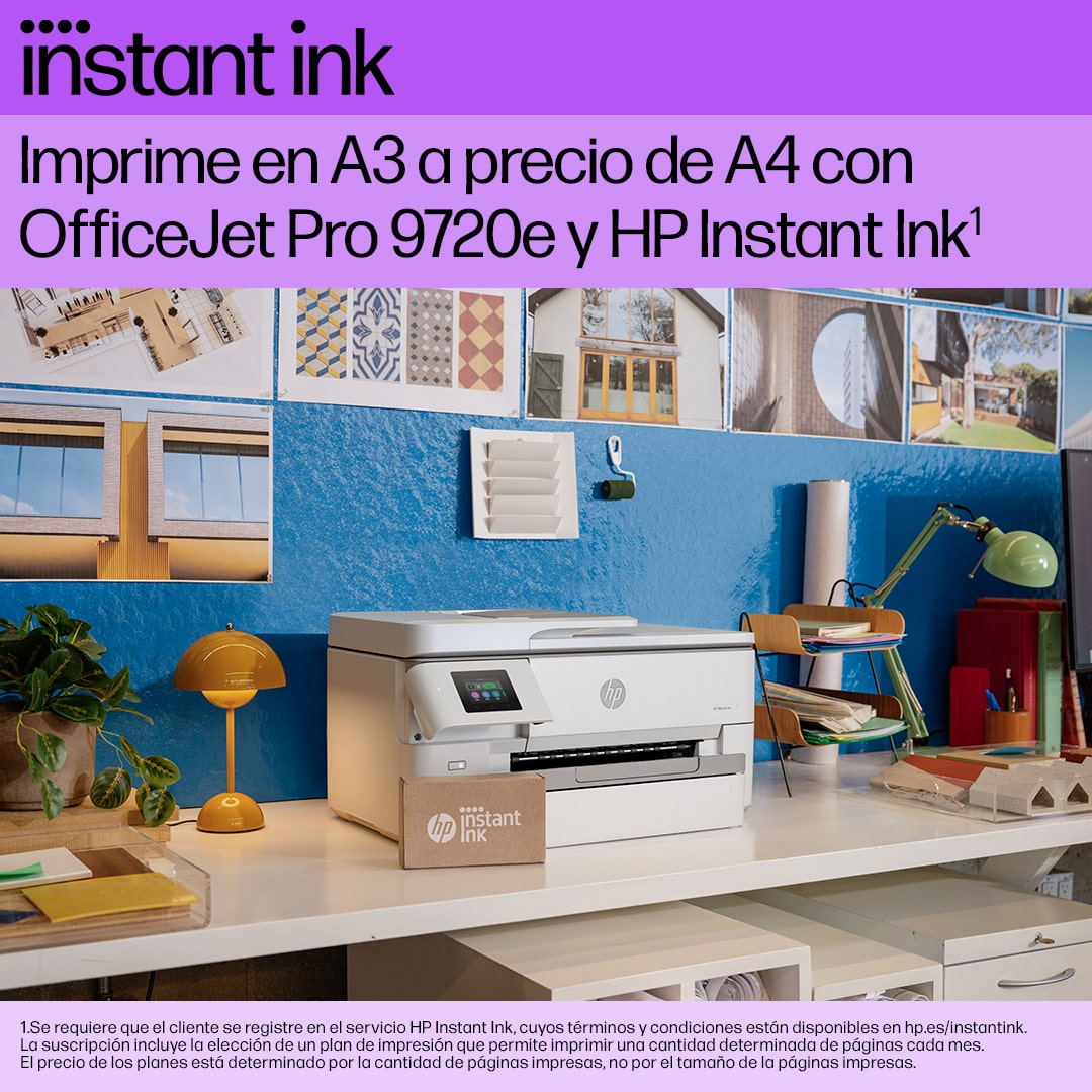 Un entorno de oficina con una impresora, escritorio y una pared azul con arte y el texto 'instant ink'.