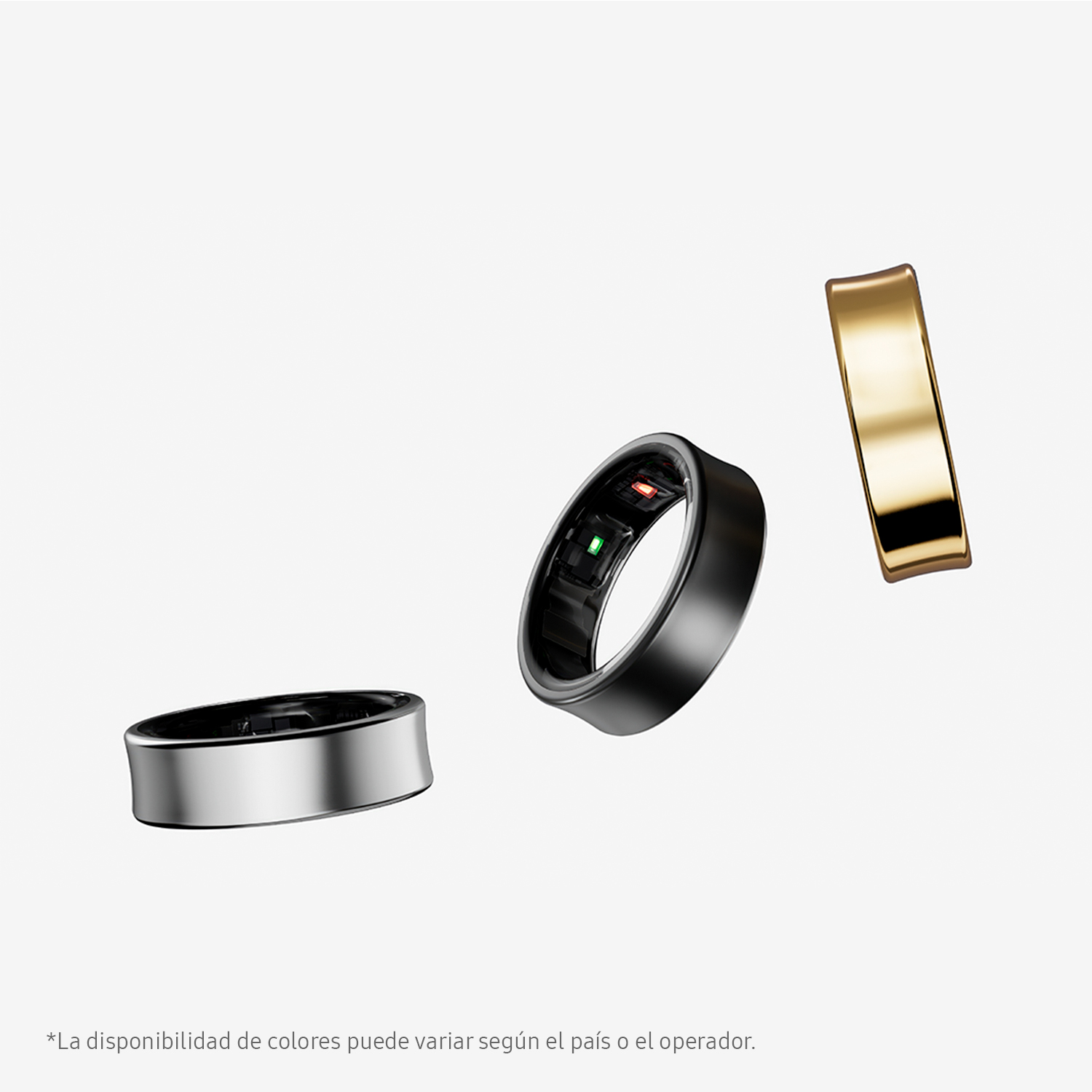 Tres anillos negro, plateado y dorado flotan sobre fondo blanco. El anillo negro tiene luces de colores.