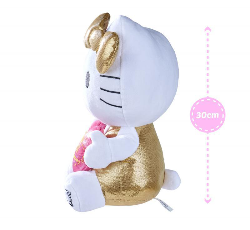 Ein weißes Hello Kitty-Plüschtier mit goldenen Akzenten und einem rosa Herz.