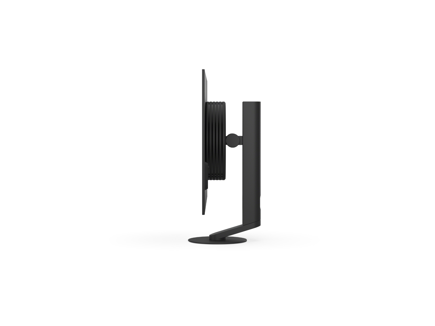 Moniteur noir en vue latérale. Il a un support noir. Fond blanc. L'écran est noir.