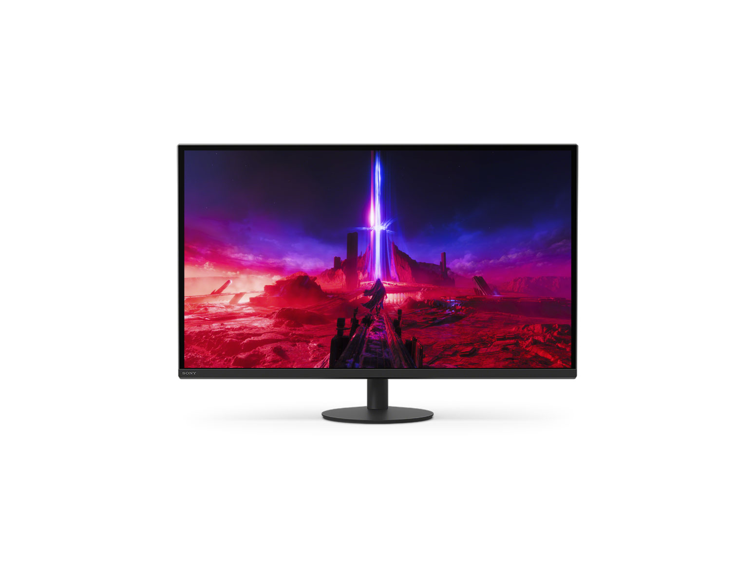 Un monitor nero che mostra un paesaggio rosso e viola con una struttura centrale luminosa.