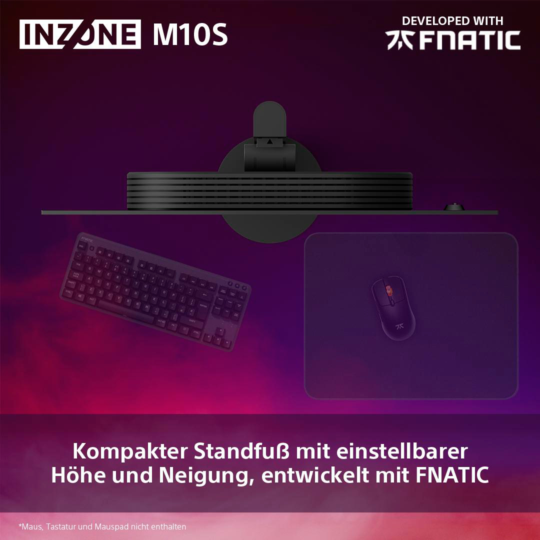 Gaming-Monitor-Setup. Tastatur, Maus und Monitor auf einem Schreibtisch. Lila Hintergrund.