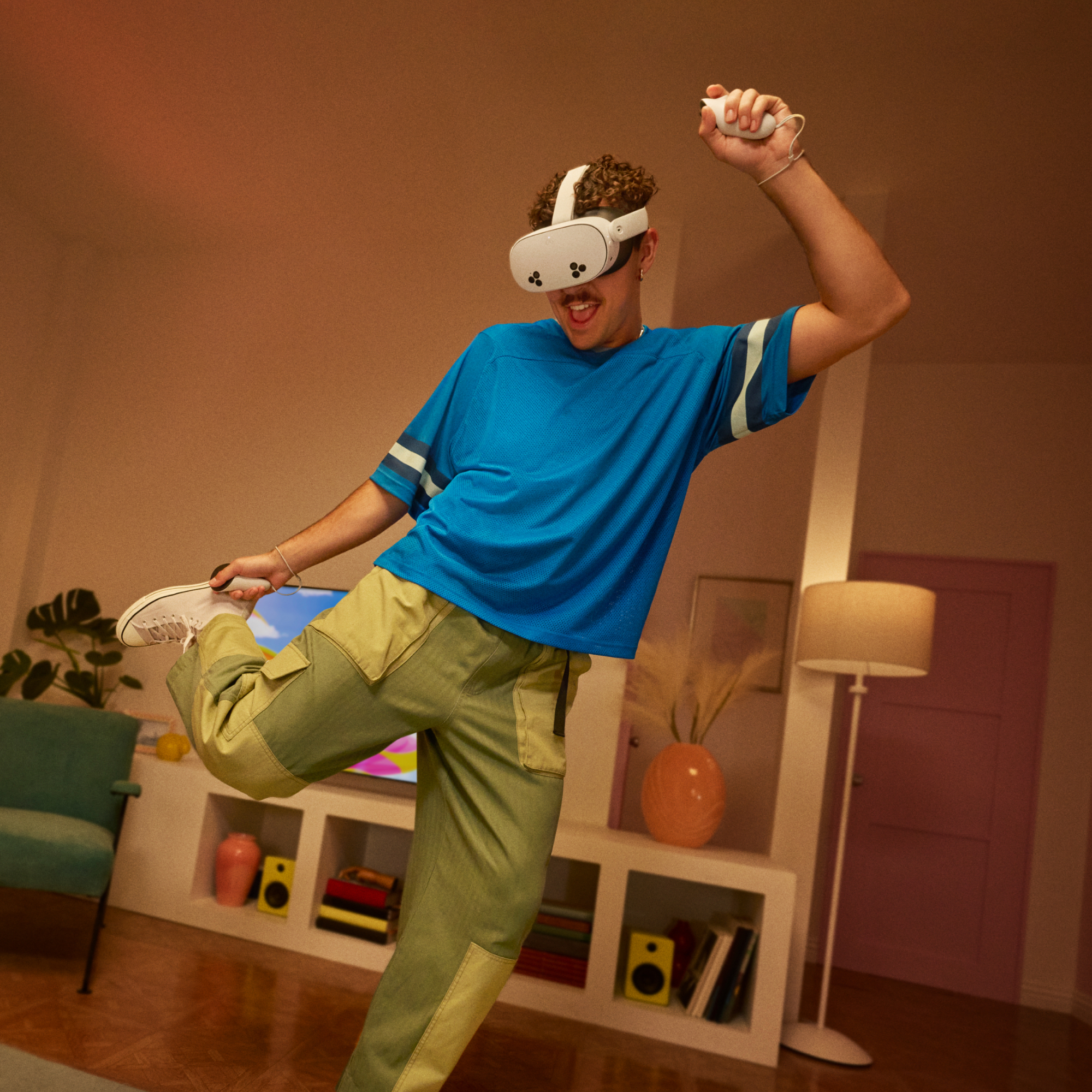 A man wearing VR glasses and playing games, indoors, dancing.