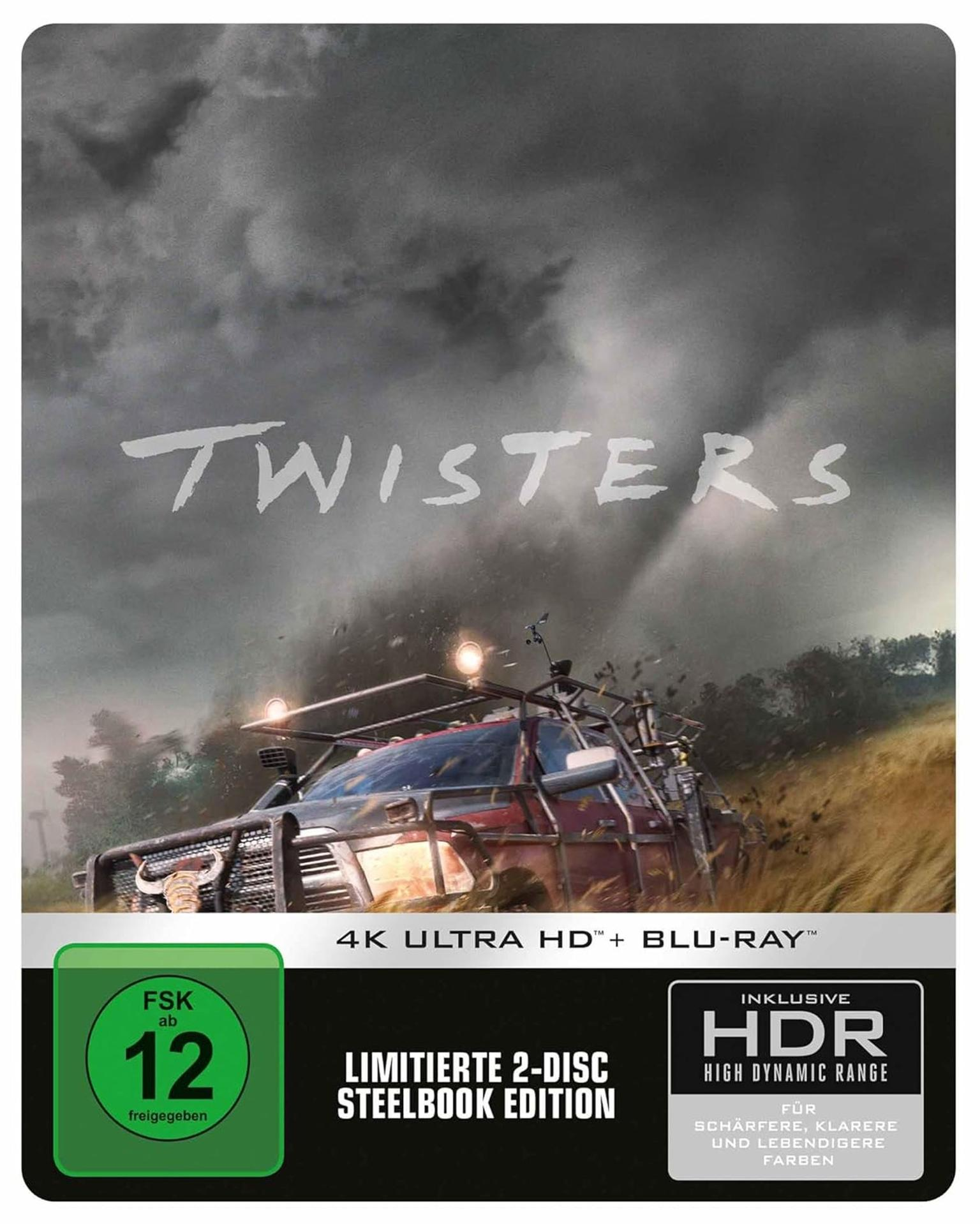 Filmcover von 'Twisters'. Ein roter LKW fährt in einem Sturm.