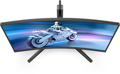 Felülnézet egy ívelt monitorról, motoros jelenettel.