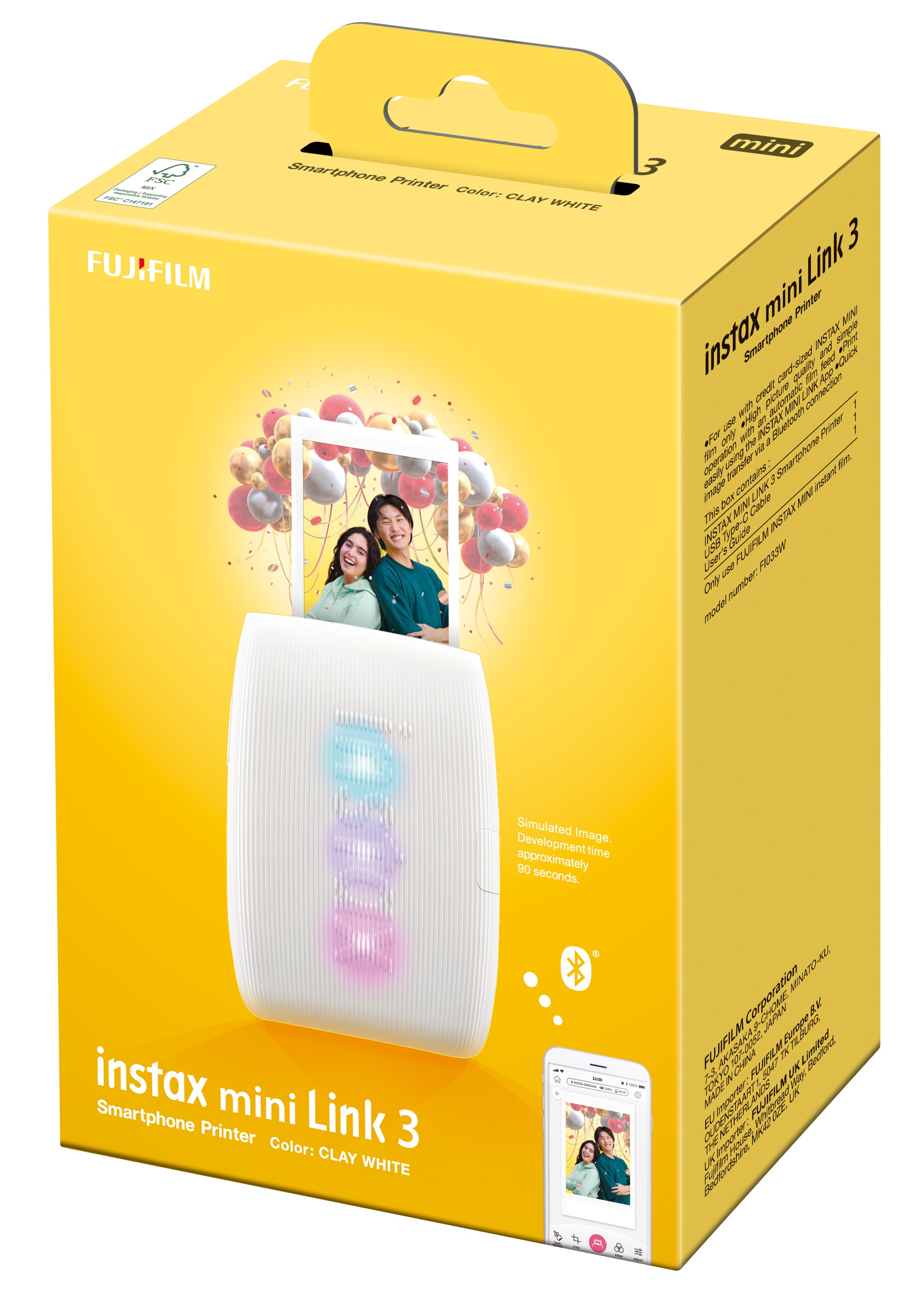 Pudełko z drukarką do smartfona, ze zdjęciem i balonami.