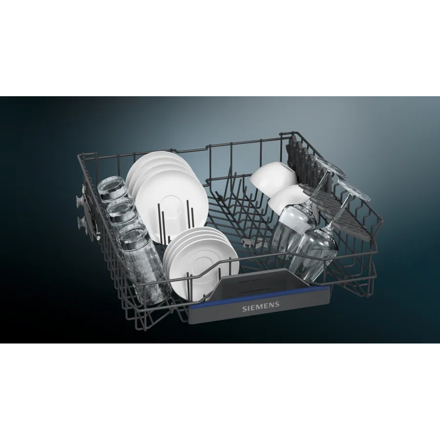 Dishwasher basket with dishes, glasses, and utensils. Dark background. Siemens logo.