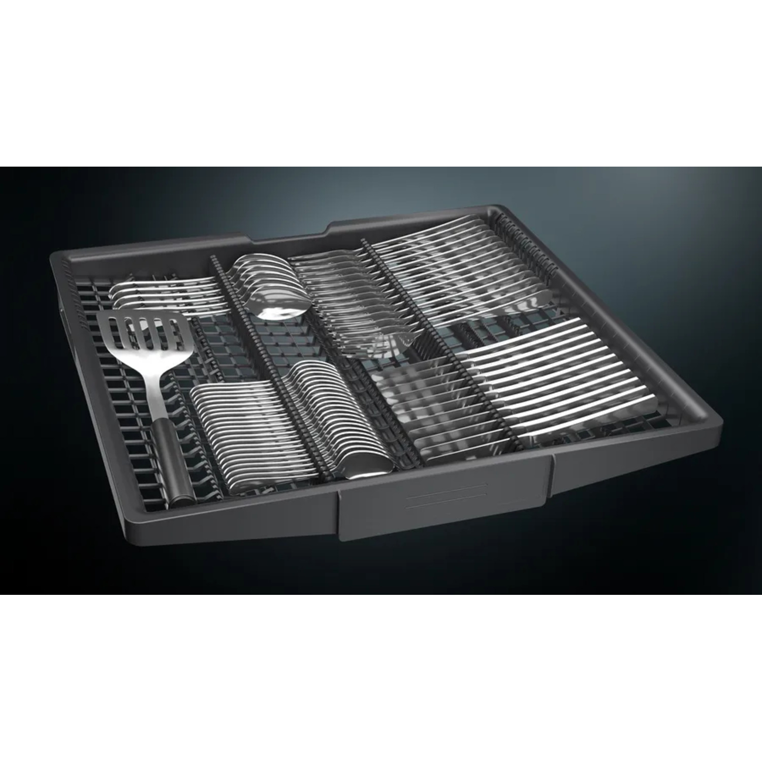 Dishwasher basket loaded with silverware. Spoons, forks, and serving utensils in a black tray.