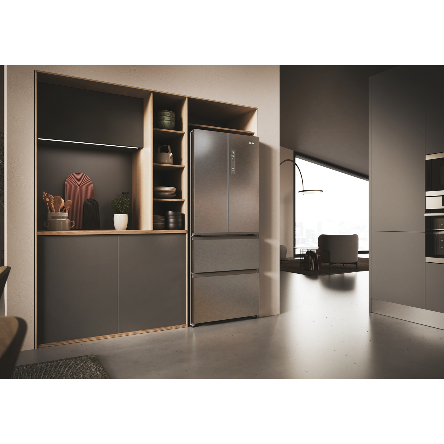 Modern kitchen interior with a refrigerator and dark cabinets.