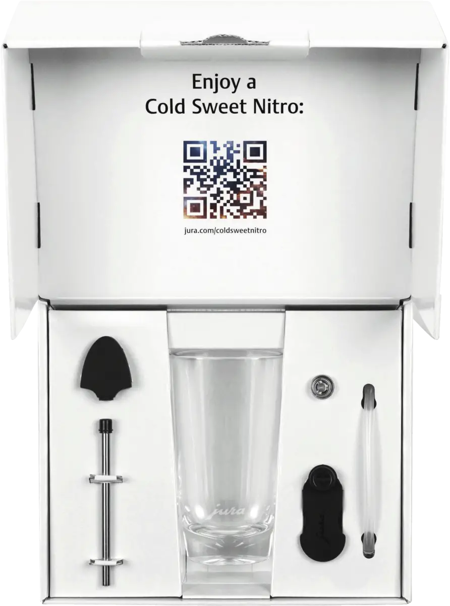 Scatola aperta con accessori per caffè, tra cui un bicchiere e un codice QR.