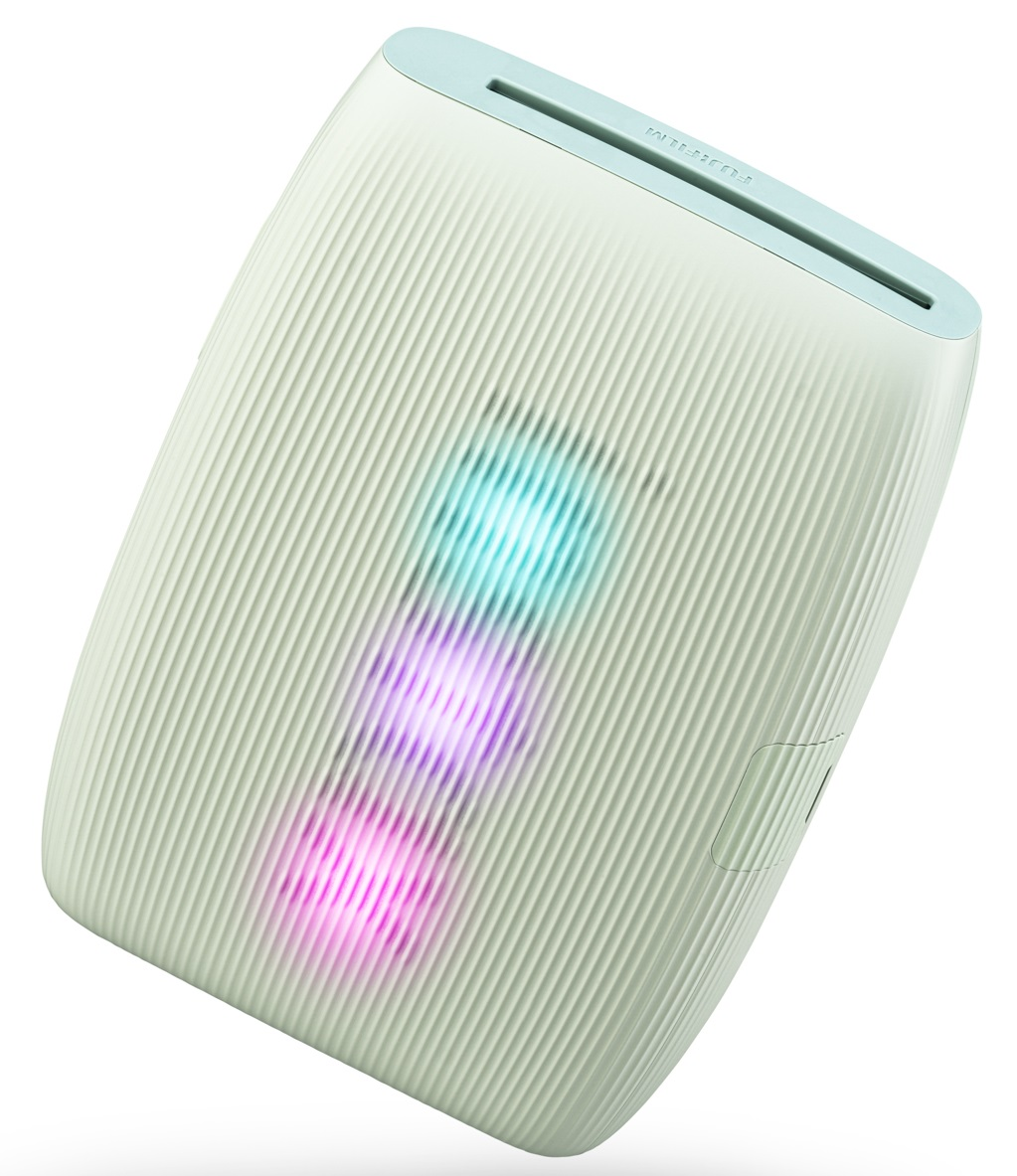 Dwa paski do Apple Watch, jeden biały i jeden czarny, z metalowymi zapięciami.