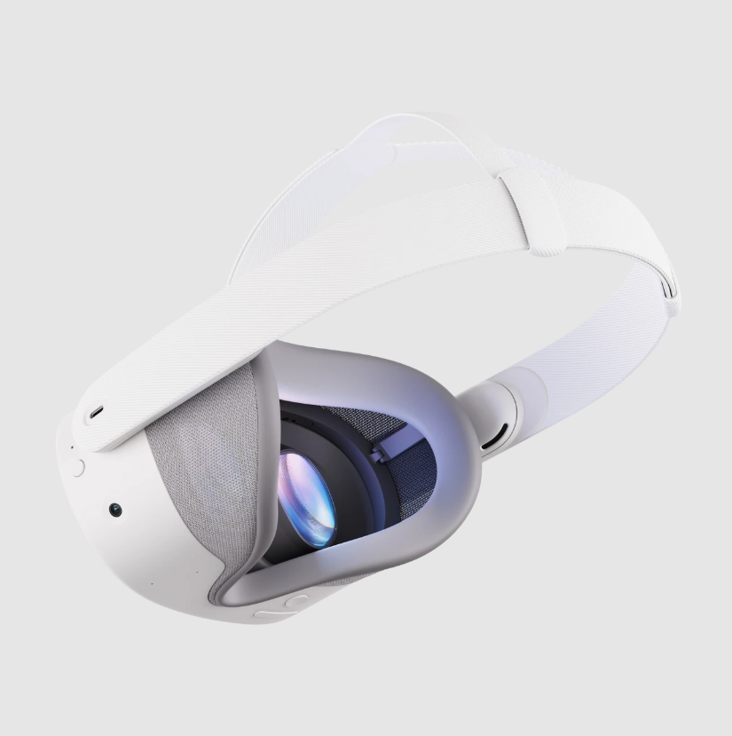 Auriculares de realidad virtual blancos con lente abierta que muestra componentes internos.