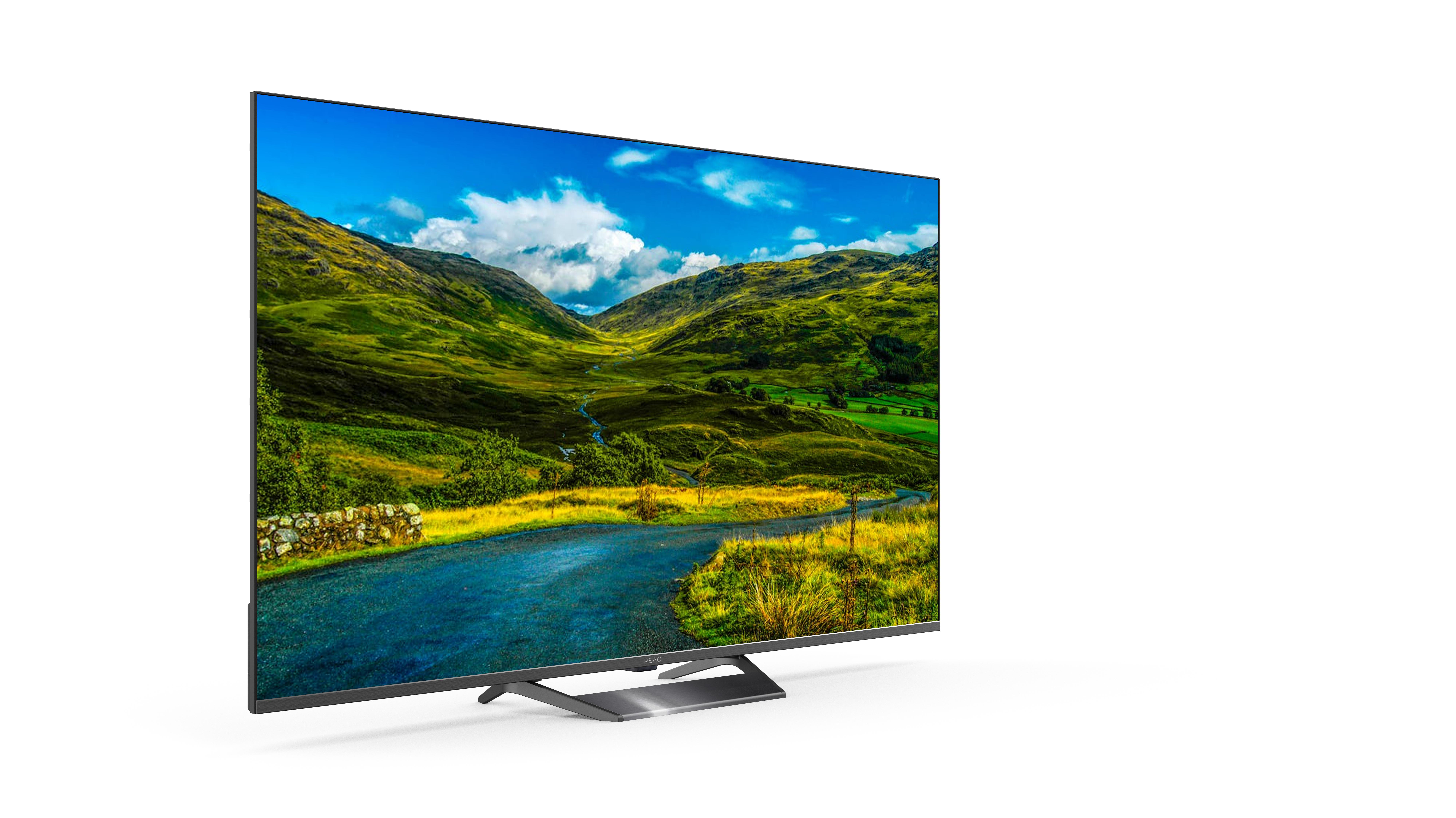 Breitbild-TV mit Landschaft aus grünen Hügeln und kurviger Straße.