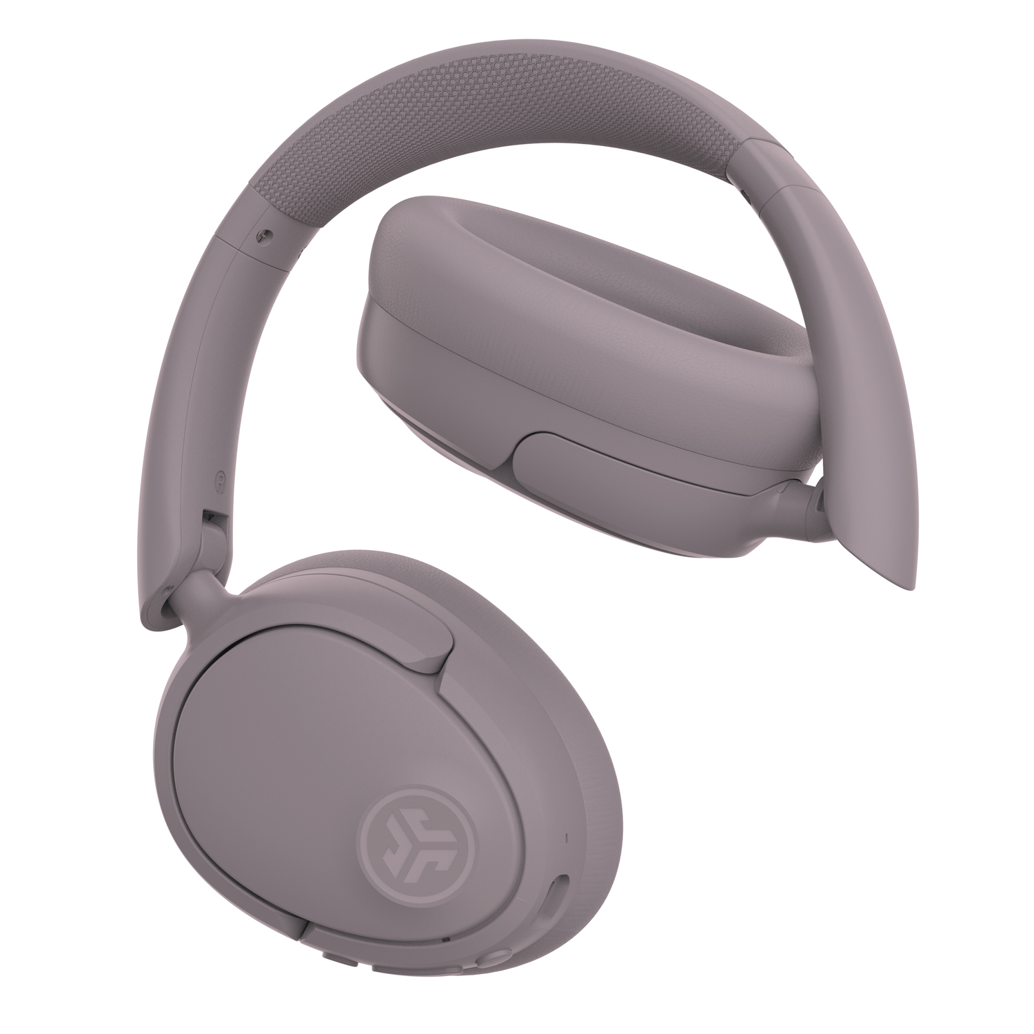Casque gris plié, avec les écouteurs orientés vers le haut, montrant le logo JLab.
