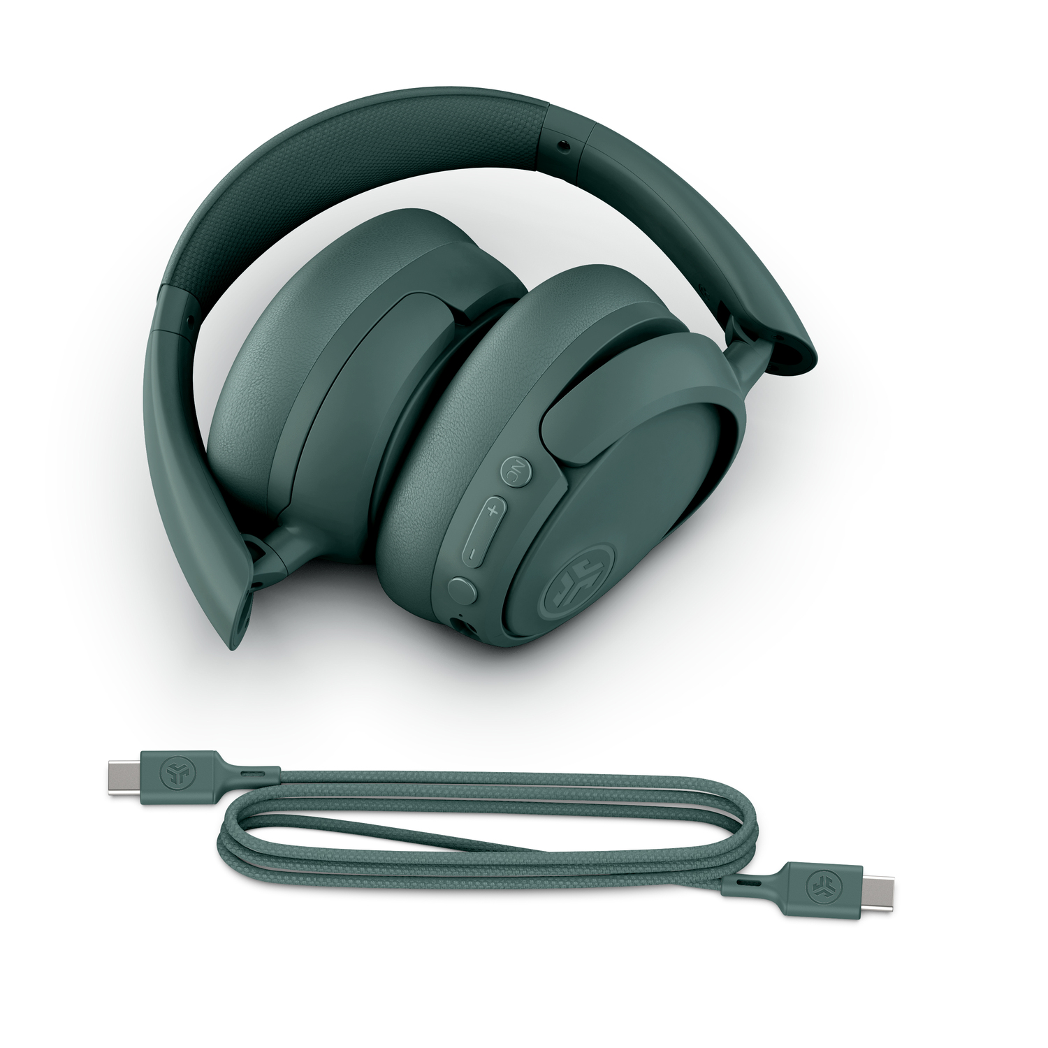 Green headphones folded with a charging cable on a white background.