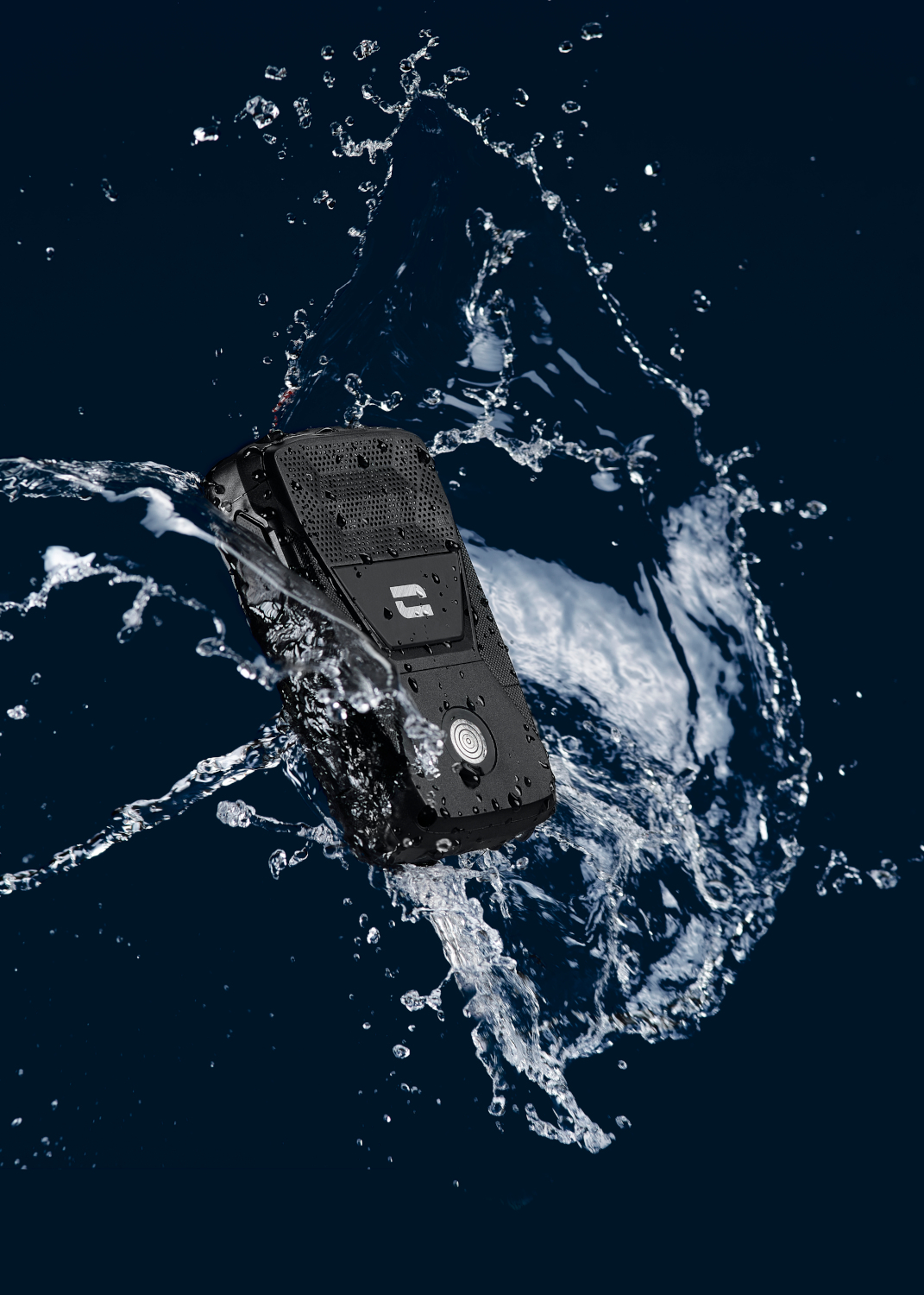 A black, rugged phone is splashed with water, creating a dynamic effect.