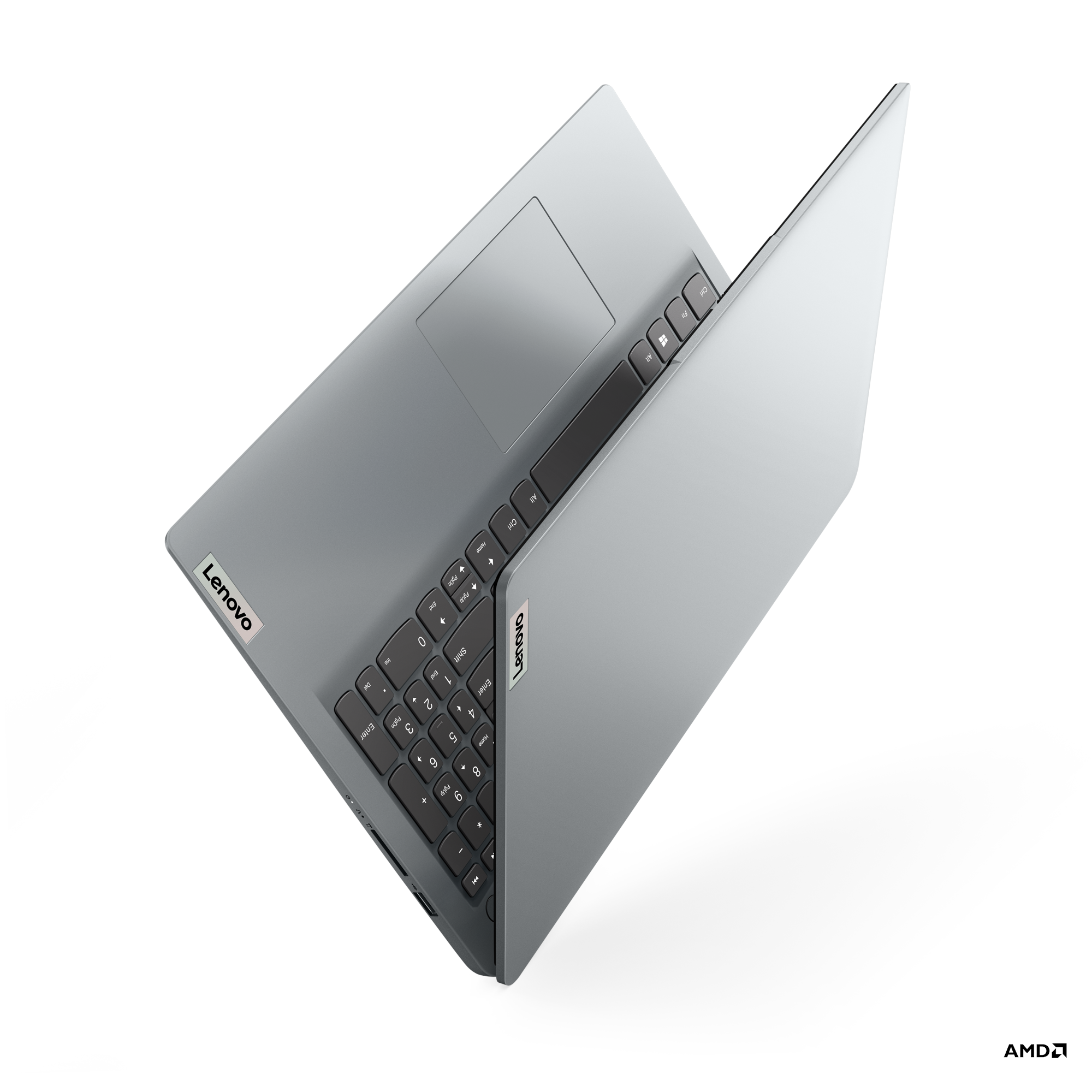 Gümüş Lenovo dizüstü bilgisayar, açık, klavyeyi ve ekranı gösteriyor, siyah arka planda.