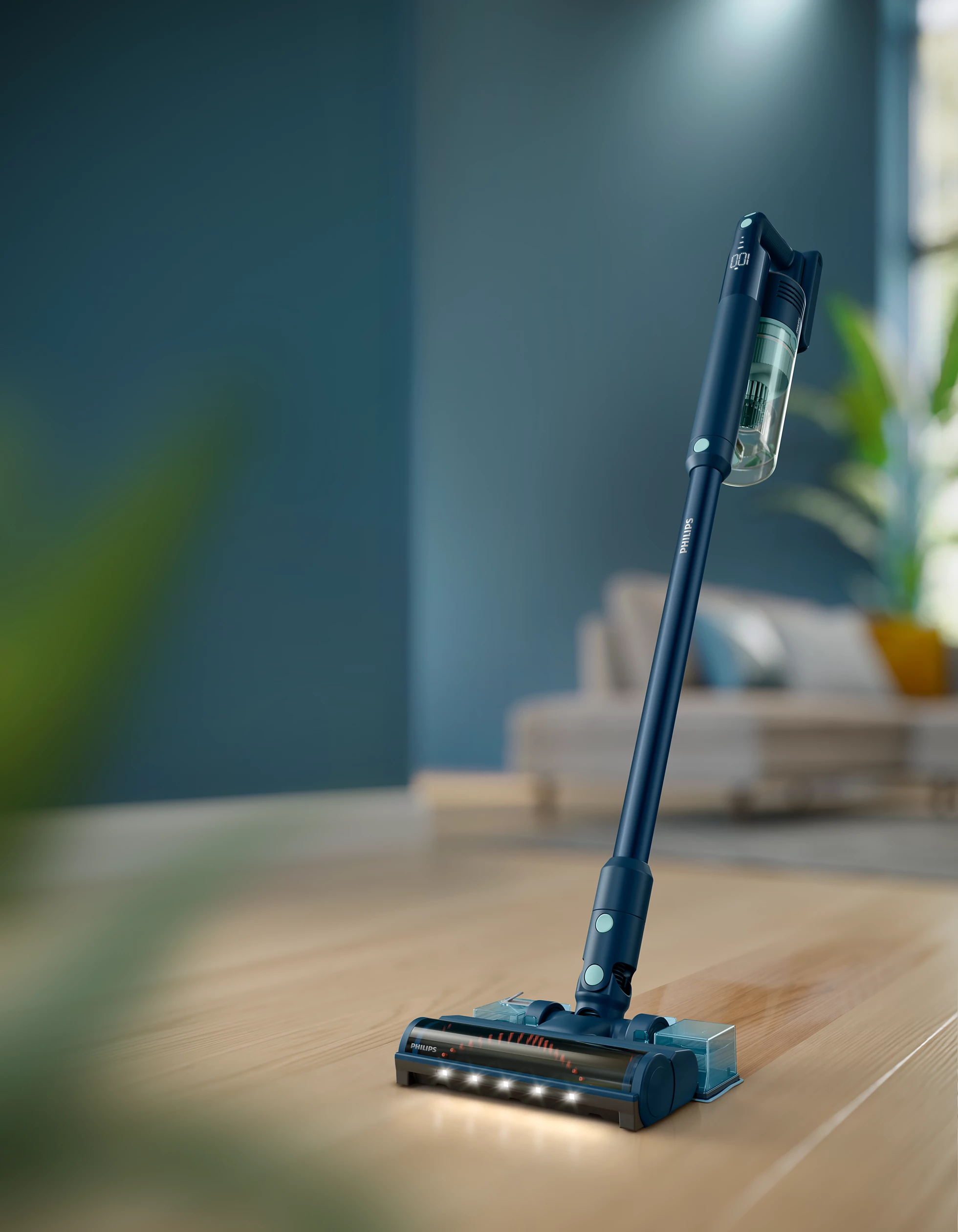 Aspirateur sans fil Philips bleu sur parquet.