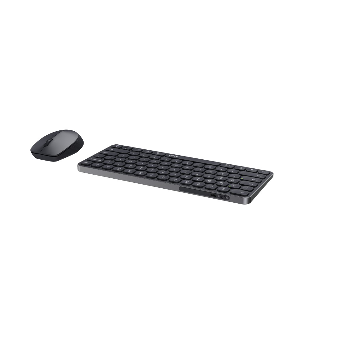 Schwarzes Tastatur- und Maus-Set auf weißer Oberfläche, minimalistisches Design.