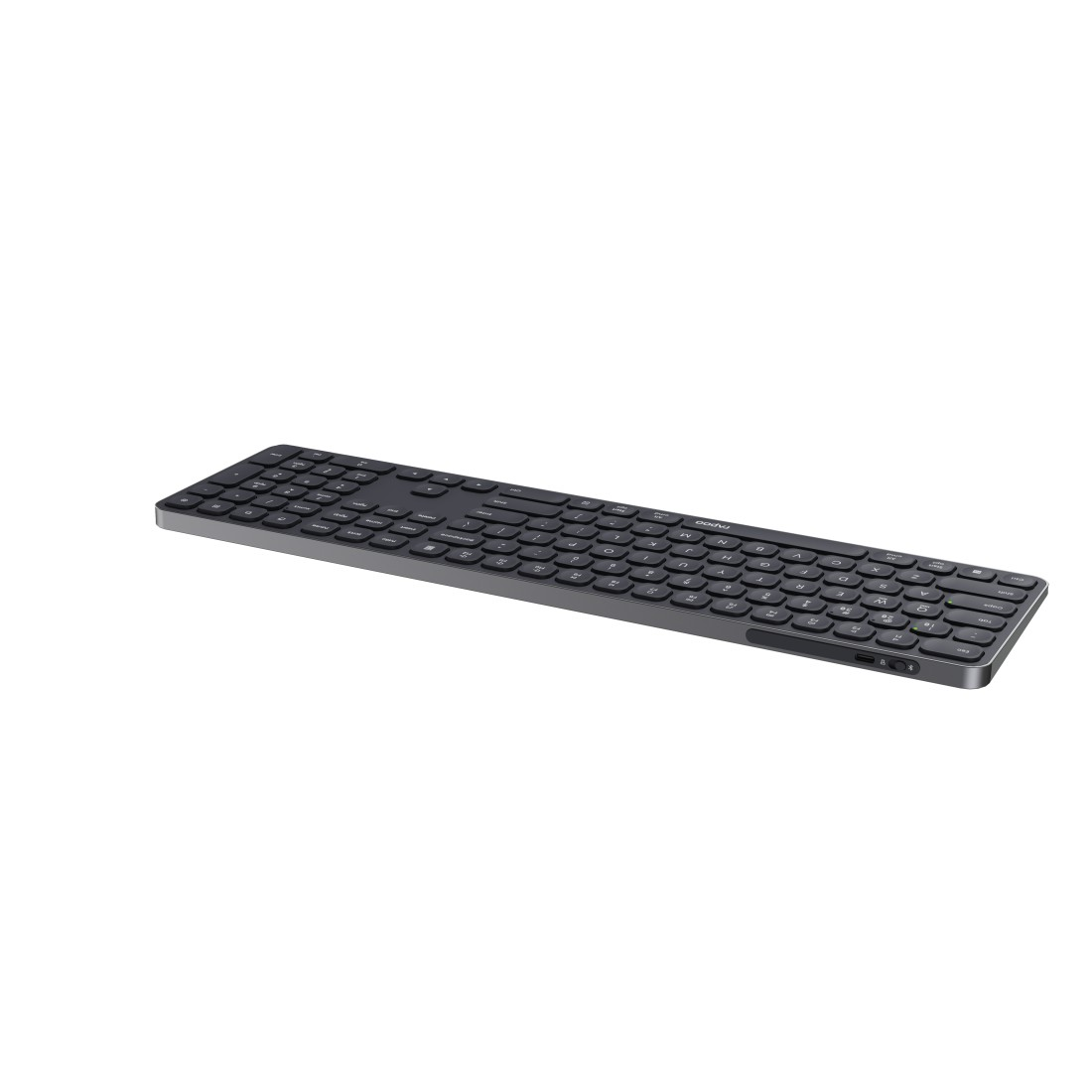 Eine schwarze Tastatur auf einer weißen Oberfläche, die das gesamte Tastenlayout zeigt.