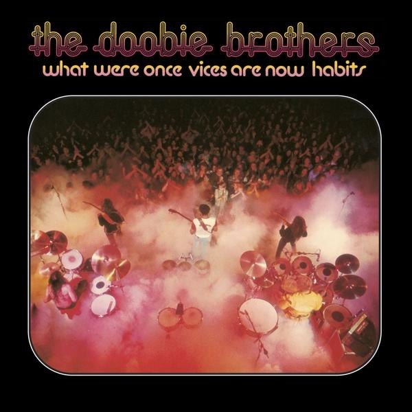 The Doobie Brothers album borítója. Koncertközönség, zenészek a színpadon. Fekete háttér.