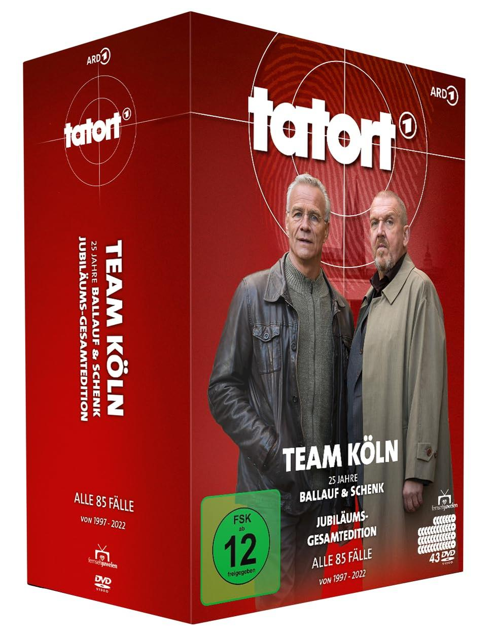 DVD-Box-Set, mit Bildern von zwei Männern, Text: 'Team Köln', deutscher Text und eine Bewertung.