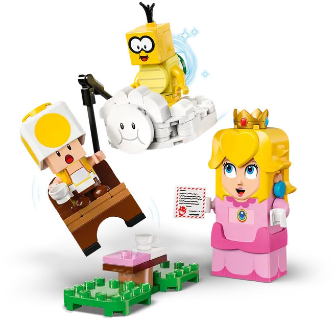 Zestaw Lego z Księżniczką Peach, Toadem i postacią Lakitu. Stoją na scenie.