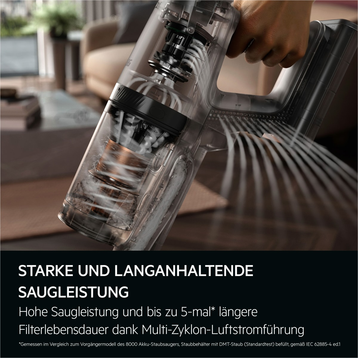 Ein transparenter Staubsauger wird gehalten, der seine Innenteile zeigt. Der Text darunter lautet: Starke und langlebige Saugkraft.