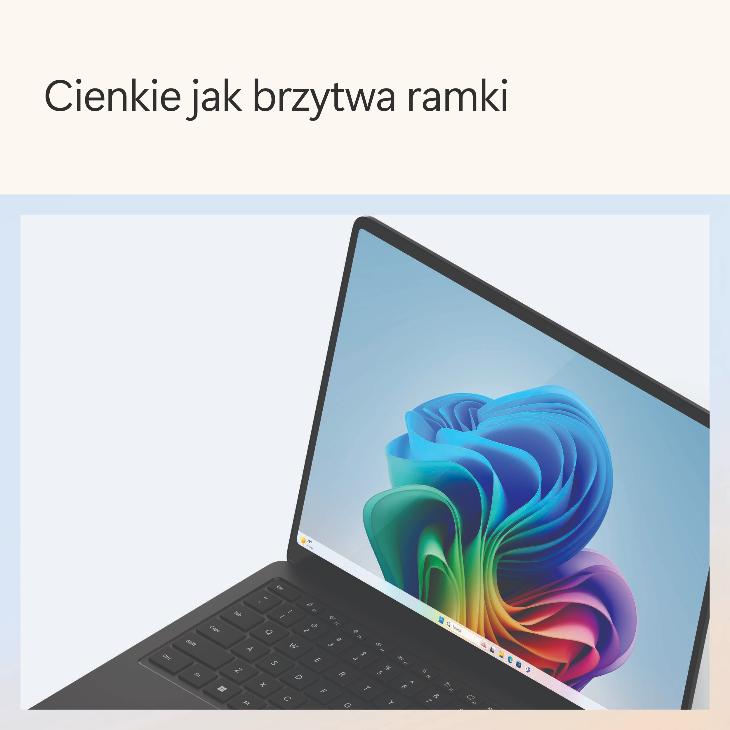 Laptop z kolorowym wyświetlaczem Windows, widoczna klawiatura.